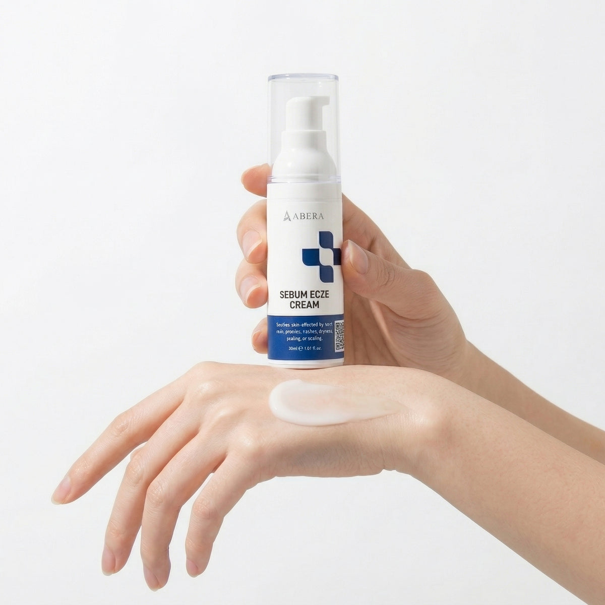 Applying Abera Sebum Ecze Cream to a dry-looking facial area